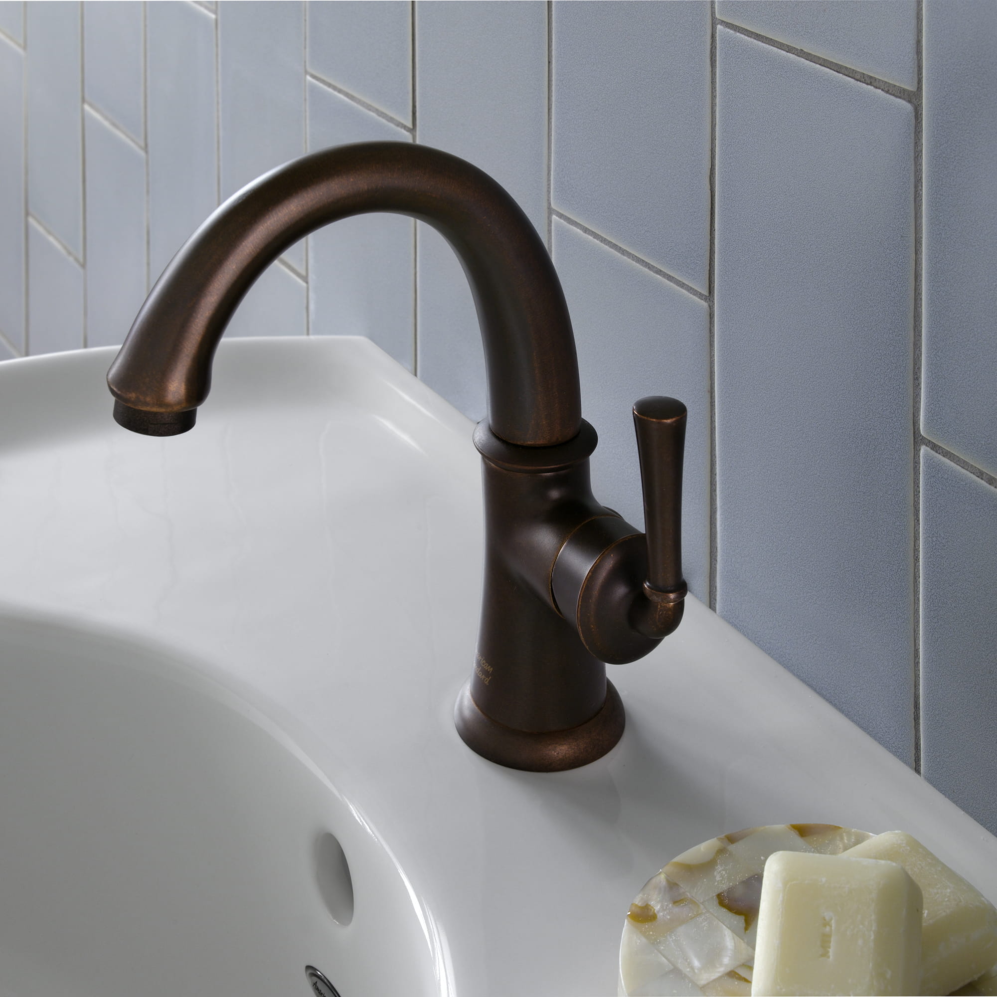 Portsmouth Single Hole Single Handle High Arc Bathroom Faucet 12 GPM with Lever Handle OIL RUBBED BRONZE